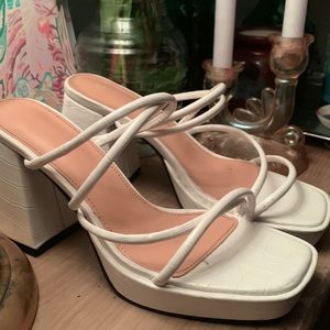white strapped sandal heels